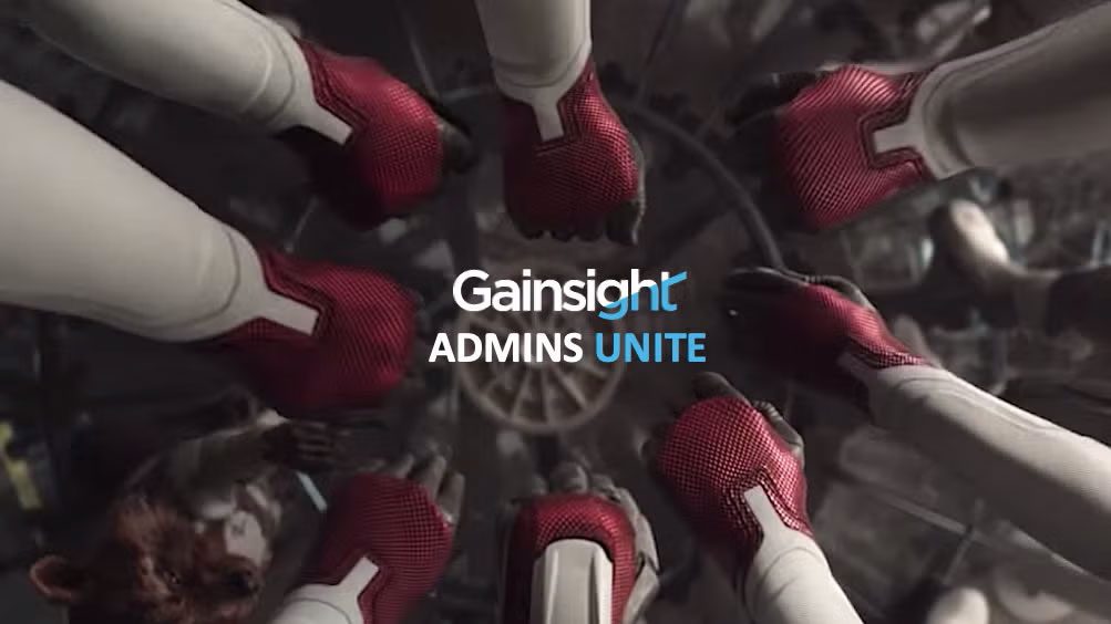 A group of people in white suits with red gloves forms a central circle, touching their fists together. The text 